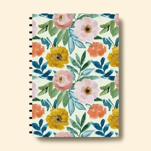 May include: A spiral bound notebook with a floral pattern. The cover features a watercolor design of pink, yellow, and orange flowers with green leaves on a white background.