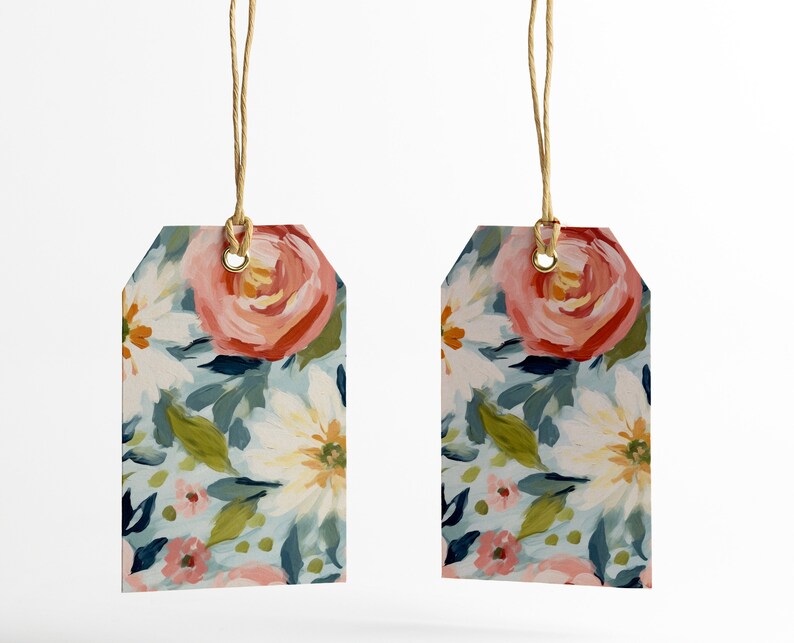 May include: Two floral gift tags with a blue, green, white and pink floral pattern. The tags are attached to twine.
