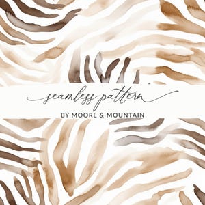 May include: Watercolor seamless pattern in shades of brown and beige, resembling animal print. The text "seamless pattern" is written in cursive, with "BY MOORE & MOUNTAIN" below it. The design features flowing, organic shapes.
