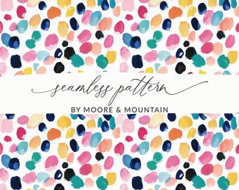 May include: A seamless pattern design with colourful brushstrokes in pink, blue, yellow, orange, green, and black on a white background. The text "seamless pattern" and "BY MOORE & MOUNTAIN" are displayed on a white banner.