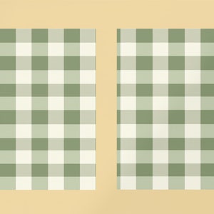 May include: Two green and white gingham patterned fabric squares.