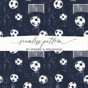 May include: A seamless pattern featuring white soccer balls and goal nets on a dark blue background. The pattern is designed by Moore & Mountain.