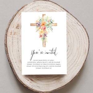 May include: A white card with a watercolor illustration of a wooden cross adorned with colorful flowers. The text "You're invited" is written in black cursive script. Below the text is a block of lorem ipsum text.
