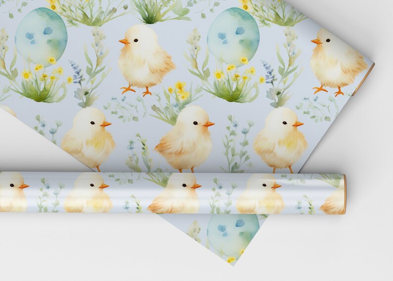 May include: A blue and white wrapping paper with a repeating pattern of yellow chicks, green leaves, and blue eggs. The paper is rolled up and the ends are visible.