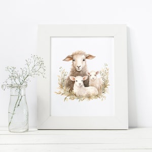 May include: A watercolor painting of a mother sheep and two lambs. The sheep are white with brown markings and are surrounded by brown and green foliage.