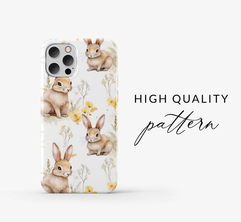 May include: A white phone case with a repeating pattern of brown bunnies and yellow flowers. The text "HIGH QUALITY pattern" is printed on the right side of the case.