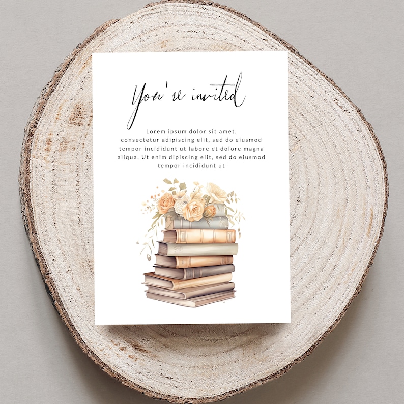 May include: A white card with the text "You're invited" in black cursive script. The card features a watercolor illustration of a stack of vintage books with a bouquet of cream-colored roses on top.