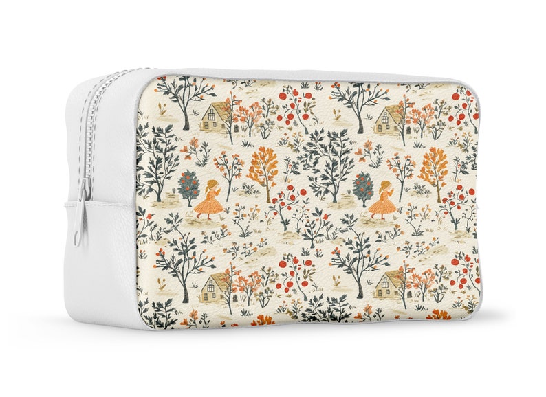 Puede incluir: Bolsa blanca con cremallera con un fondo crema y un patr&oacute;n repetido de peque&ntilde;as casas, &aacute;rboles y personas. El patr&oacute;n est&aacute; en tonos de naranja, rojo, verde y azul.