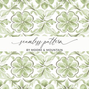 May include: A seamless pattern featuring sage green watercolour floral motifs on a white background. A central white horizontal band displays the text seamless pattern by Moore & Mountain in black script and sans-serif lettering.
