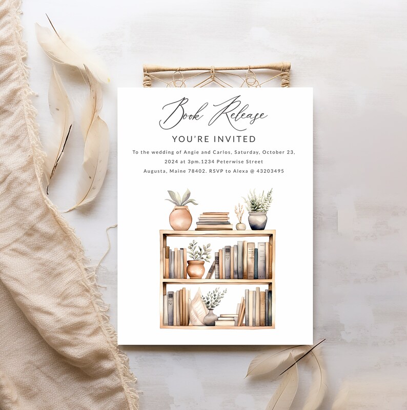 May include: A wedding invitation with a watercolor illustration of a bookshelf filled with books, plants, and decorative items. The text reads "Book Release You're Invited To the wedding of Angie and Carlos, Saturday, October 23, 2024 at 3pm. 1234 Peterwise Street Augusta, Maine 78402. RSVP to Alexa @ 43203495"