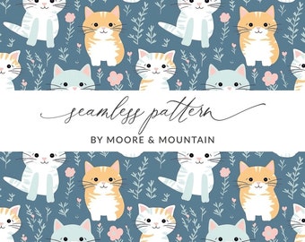 May include: A seamless pattern featuring cute cartoon cats in various colors and poses. The cats are surrounded by small pink and blue flowers and green leaves on a blue background. The text "seamless pattern" and "by Moore & Mountain" is displayed at the bottom of the image.