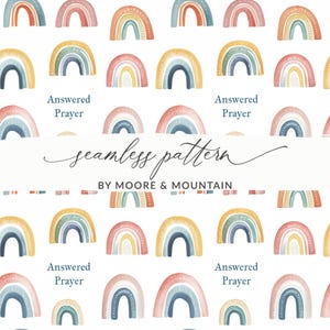 May include: A seamless pattern featuring watercolor rainbows in pastel colors. The design includes text that reads "Answered Prayer" and "seamless pattern by Moore & Mountain". The rainbows are in shades of blue, yellow, pink, and orange.