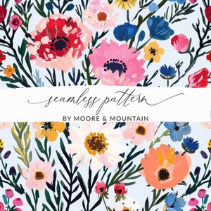 May include: A seamless floral pattern featuring a variety of colorful flowers in shades of red, pink, yellow, and blue, with green foliage on a light blue background. The text "seamless pattern" and "BY MOORE & MOUNTAIN" are displayed.