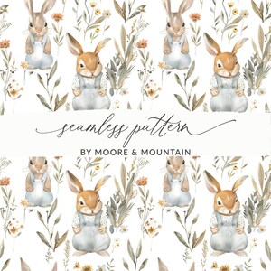 May include: A seamless pattern featuring watercolor illustrations of bunnies wearing overalls and surrounded by flowers and foliage. The text "seamless pattern" and "BY MOORE & MOUNTAIN" is included in the design.