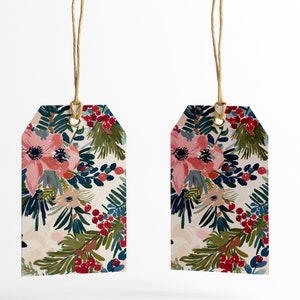May include: Two floral gift tags with a white background and a colorful floral pattern. The tags are tied with twine and have a gold metal eyelet.
