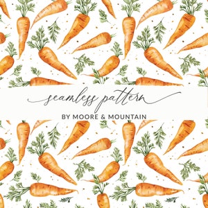 May include: A seamless pattern featuring watercolor illustrations of orange carrots with green tops scattered across a white background. The text "seamless pattern" is written in cursive, with "BY MOORE & MOUNTAIN" below it.