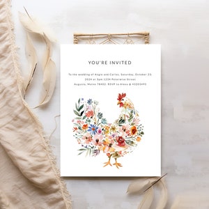 May include: A wedding invitation with a watercolor illustration of a rooster made of flowers. The text reads "You're Invited" to the wedding of Angie and Carlos, Saturday, October 23, 2024 at 3pm. 1234 Peterwise Street, Augusta, Maine 78402. RSVP to Alexa @ 43203495.
