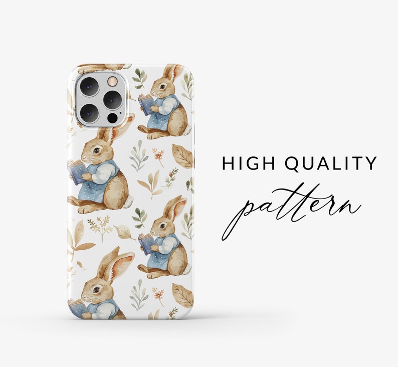 May include: A white phone case with a repeating pattern of brown rabbits holding books, blue dresses, and brown leaves. The text "HIGH QUALITY pattern" is visible on the right side of the image.