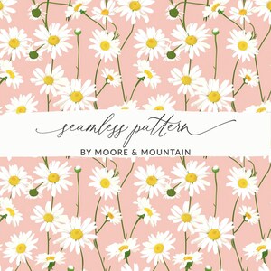 May include: A seamless pattern featuring white daisies with yellow centers on a light pink background. The text "seamless pattern" and "BY MOORE & MOUNTAIN" is displayed on a white banner.