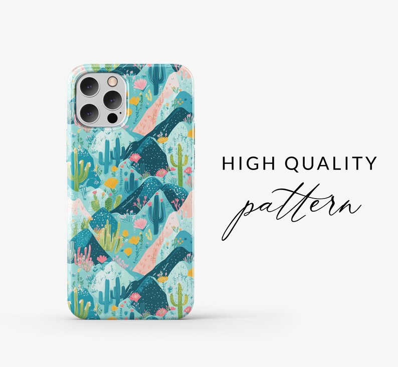 May include: A phone case with a colorful pattern of mountains, cacti, and flowers. The case is designed for an iPhone with a camera bump.