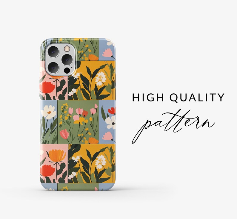 May include: A phone case featuring a colourful floral pattern. The design incorporates various coloured flowers and leaves against a yellow, green and blue backdrop.