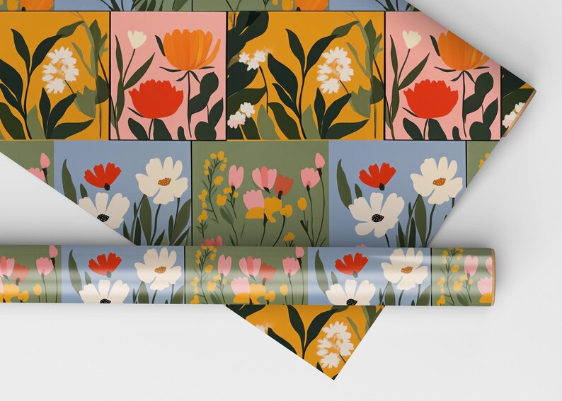 May include: A repeating pattern of colourful flowers in squares on a wrapping paper roll. The flowers are in shades of pink, orange, yellow, white, and blue.