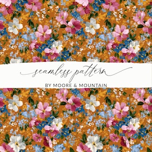 May include: A seamless floral pattern featuring pink, white, and blue flowers on a golden-brown background. The design includes the text "seamless pattern" and "BY MOORE & MOUNTAIN" in a white banner.