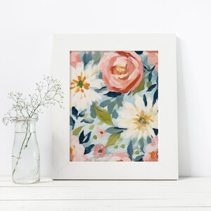 May include: A framed print of a floral pattern with pink, white, and green flowers on a blue background.