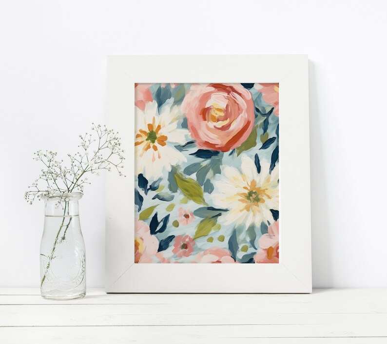 May include: A framed print of a floral pattern with pink, white, and green flowers on a blue background.