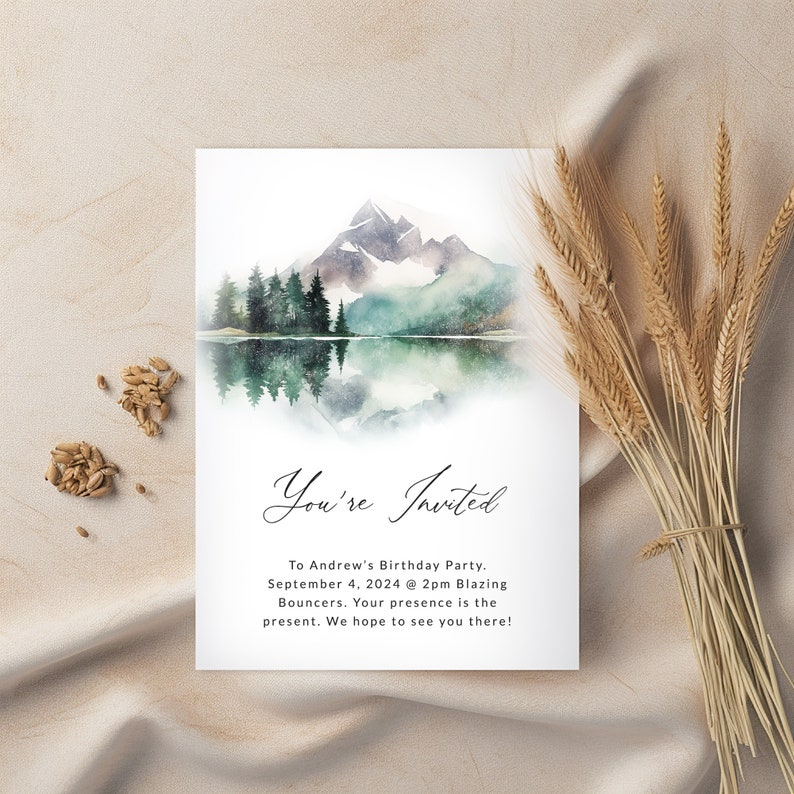 May include: A watercolor illustration of a mountain range reflected in a lake. The invitation reads "You're Invited" to Andrew's Birthday Party on September 4, 2024 at 2pm at Blazing Bouncers. The text also says "Your presence is the present. We hope to see you there!"