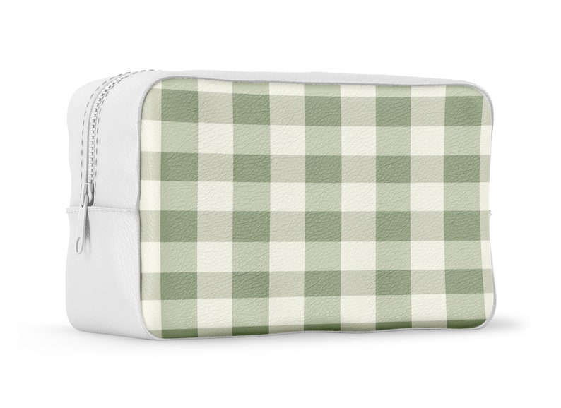 May include: White zippered pouch with a green and white gingham pattern.