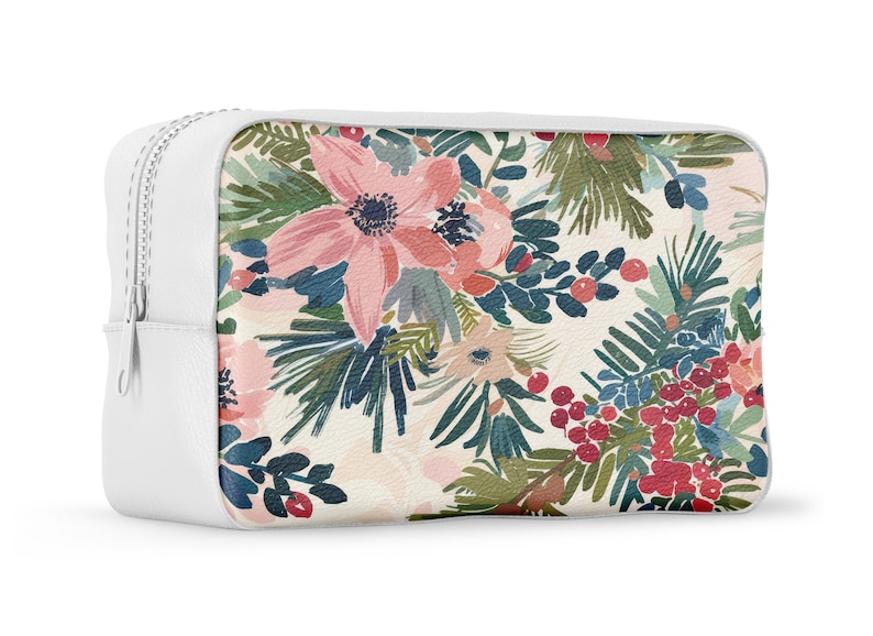 May include: White zippered pouch with a floral print featuring pink flowers, green leaves, and red berries.
