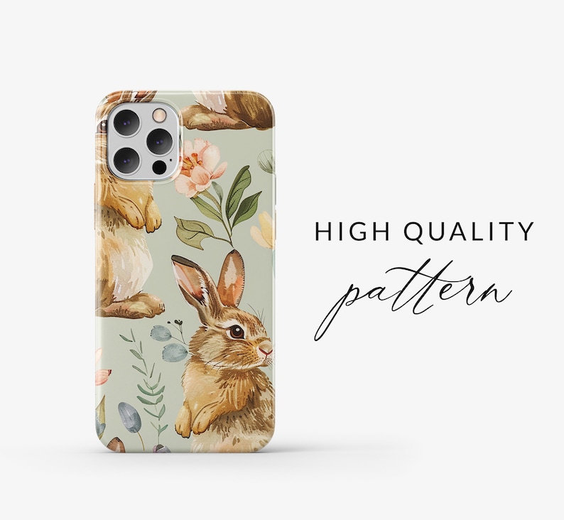 May include: A phone case with a green background and a repeating pattern of brown rabbits and pink flowers. The text "HIGH QUALITY pattern" is visible in the background.
