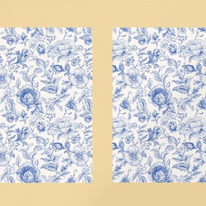 May include: Two white sheets of paper with a blue floral pattern. The pattern is a repeating design of flowers, leaves, and vines.