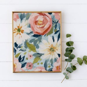 May include: A framed painting featuring a floral design. The painting depicts pink, white and blue flowers on a pale blue background.
