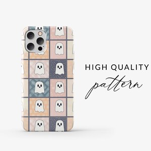 May include: A phone case with a patchwork design featuring ghost illustrations. The case has pastel-coloured squares, each with a white ghost. The text "HIGH QUALITY pattern" is displayed on the right side.