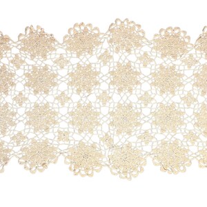 May include: A delicate, off-white crocheted doily with a floral pattern. The doily is made of fine thread and has a delicate, lacy appearance.