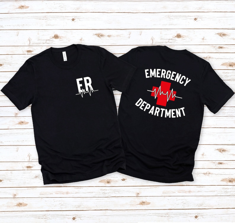 May include: Two black t-shirts with a white graphic print. The front shirt says "ER" with a heartbeat line. The back shirt says "EMERGENCY DEPARTMENT" with a red cross and a heartbeat line.