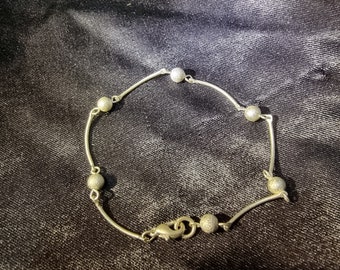 Sterling silver station ball bracelet.