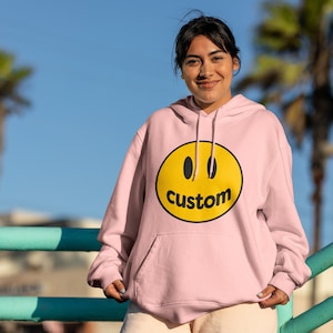 Orange smiley face hoodie sale
