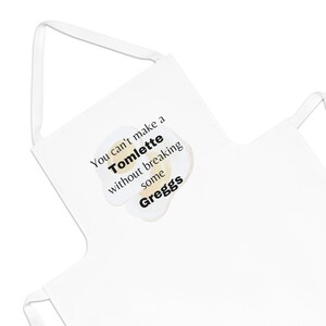 No puedes hacer un Tomlette sin romper algunos Greggs - Delantal para adultos de sucesión