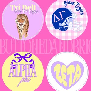 May include: Four circular badges with pink, yellow, and white backgrounds. One shows a tiger and the text "Tri Delt loves the tigers." Another has a blue football helmet and the text "geaux tigers." The other two badges have Greek letters.