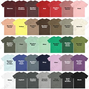 May include: A chart of 36 different colored t-shirts, each with a name printed on it. The colors include maroon, cardinal, tan, brown, olive, stone, natural, military green, sage, mint, kelly, grass green, prism ice blue, true royal, slate, navy, lilac, purple, team purple, white, asphalt, athletic heather, deep heather, dark grey heather, and black.