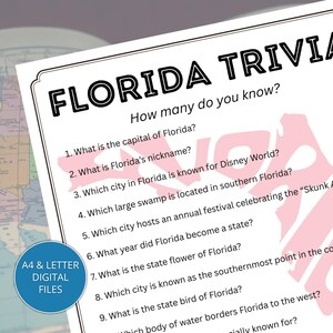May include: A white sheet of paper with the title "FLORIDA TRIVIA" in bold black letters. The text includes trivia questions about Florida, such as the capital and state bird. A blue circle with the text "A4 & LETTER DIGITAL FILES" is in the lower left corner.