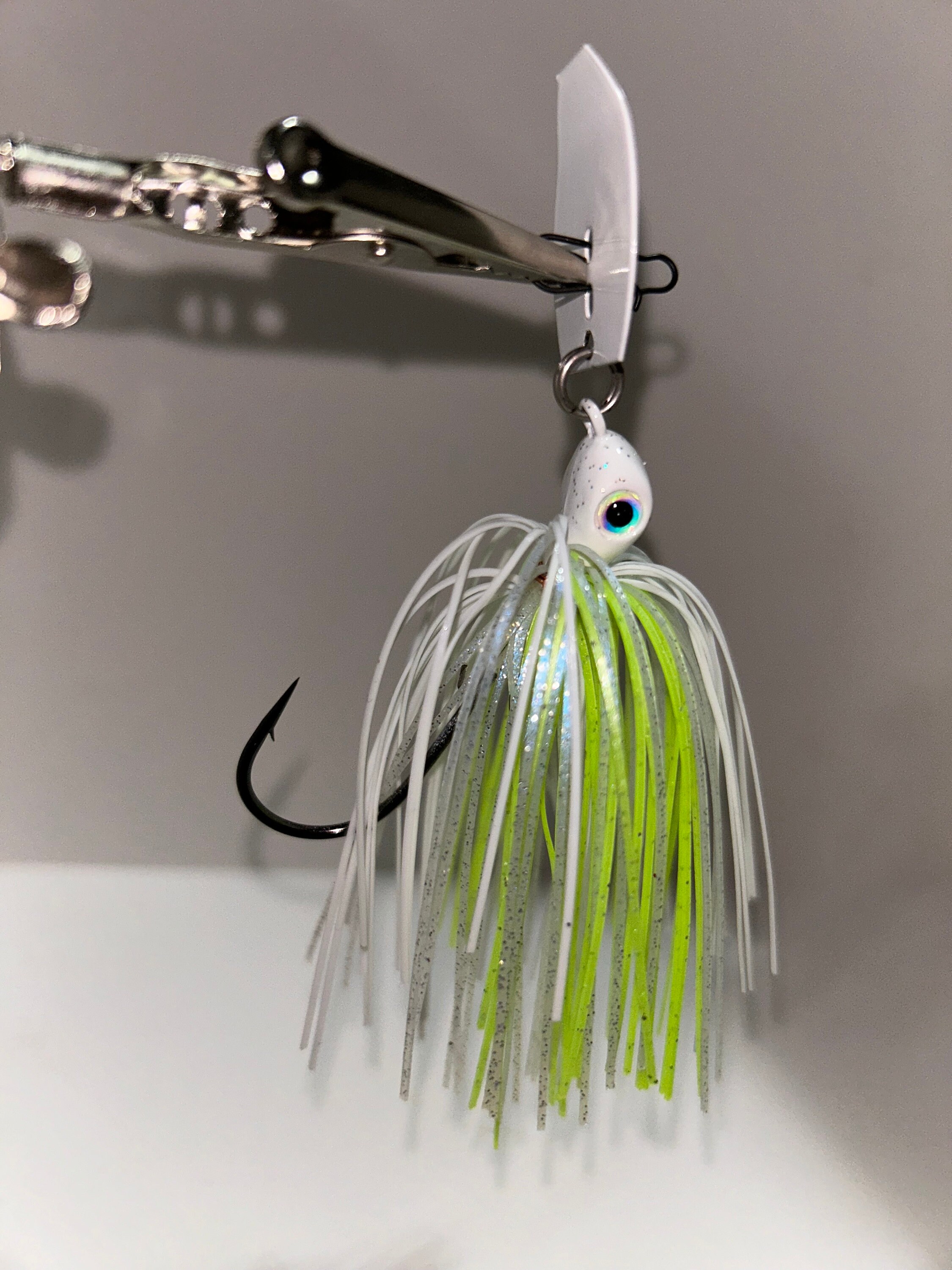 Adam's Baits custom made white and chartreuse with blue glimmer bladed jig