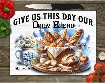 May include: A digital art print featuring a basket of bread, a vase of daisies, and the text "GIVE US THIS DAY OUR DAILY BREAD" and "Matthew 6:11". The image includes tomatoes, peppers, and a knife.