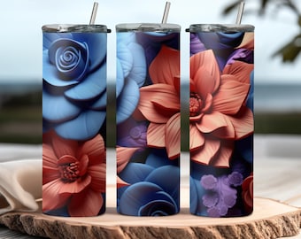 Op de afbeelding: Drie roestvrijstalen bekers met bloemenmotieven. De bekers hebben een blauw, paars en oranje bloemenmotief.