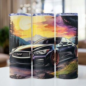 May include: A black car with a sunset background on a stainless steel tumbler. The car is a sedan with a black grille and a silver emblem. The sunset is a vibrant orange and pink with clouds in the sky. The tumbler is a tall, cylindrical shape with a lid.