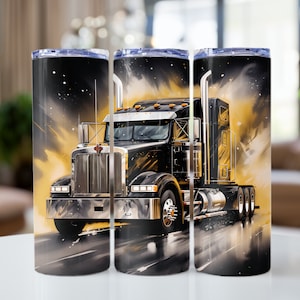 May include: A black and gold stainless steel tumbler featuring a graphic of a black semi-truck driving on a road.