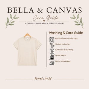 May include: A beige t-shirt on a wooden hanger with a Bella & Canvas Care Guide. The text reads: Washing & Care Guide, wash inside-out with like colors, wash in cool water, tumble dry at low-temp, do not bleach, and do not iron designs.